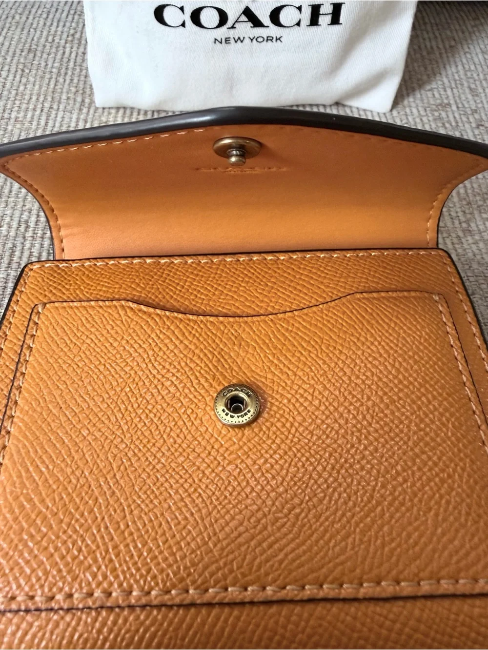 Coach Orange Leather Compact Wallet with Gold 'C' Hardware